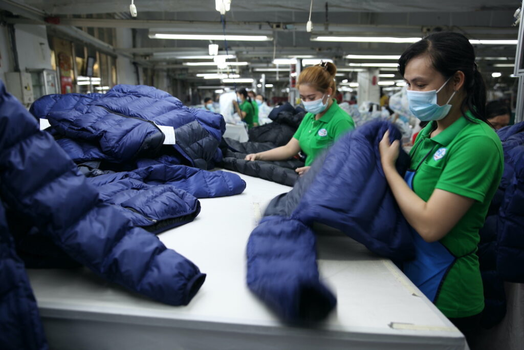 RDS certification for Otto International Vietnam 2 garment workers handling responsible down products